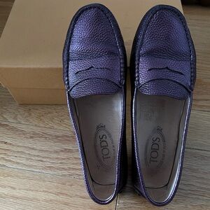 Tod's classic loafer flats in metallic purple